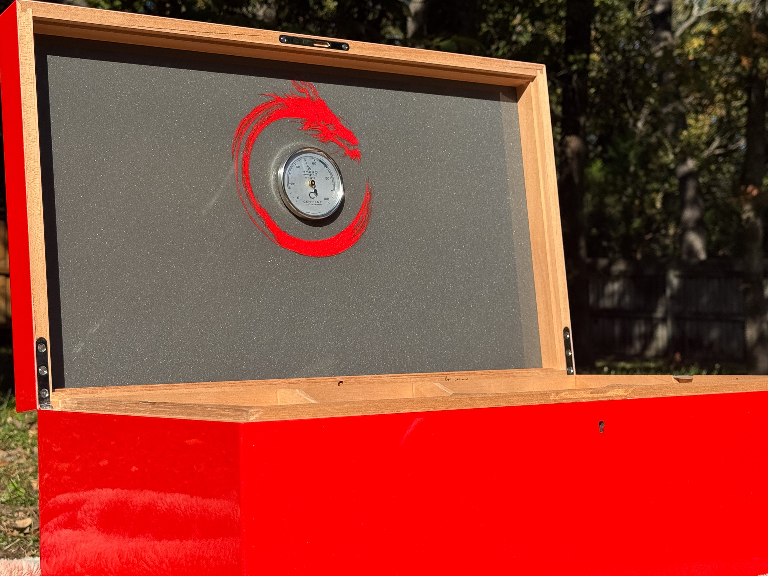 The Draconis: centient red dragon humidor inside metallic lid