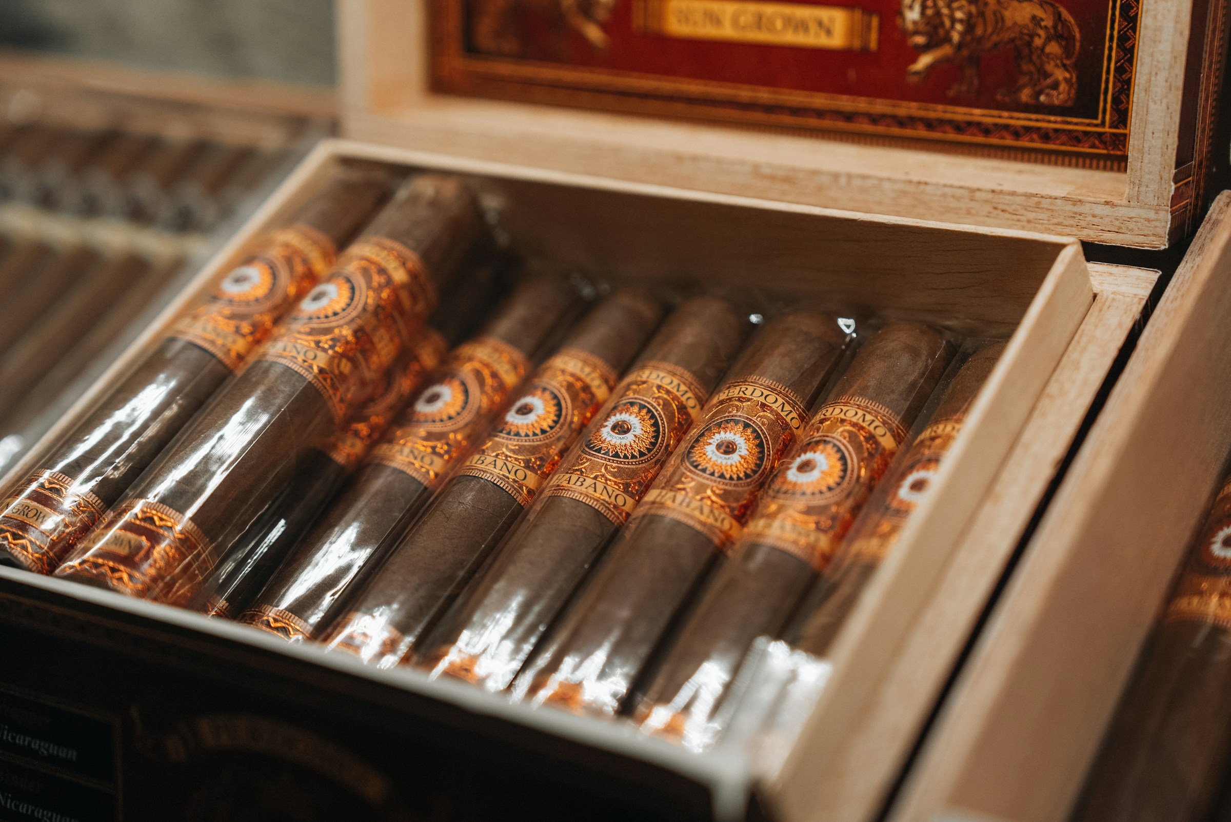 A box of cigars—the unit that ages after the roll, if the air holds.